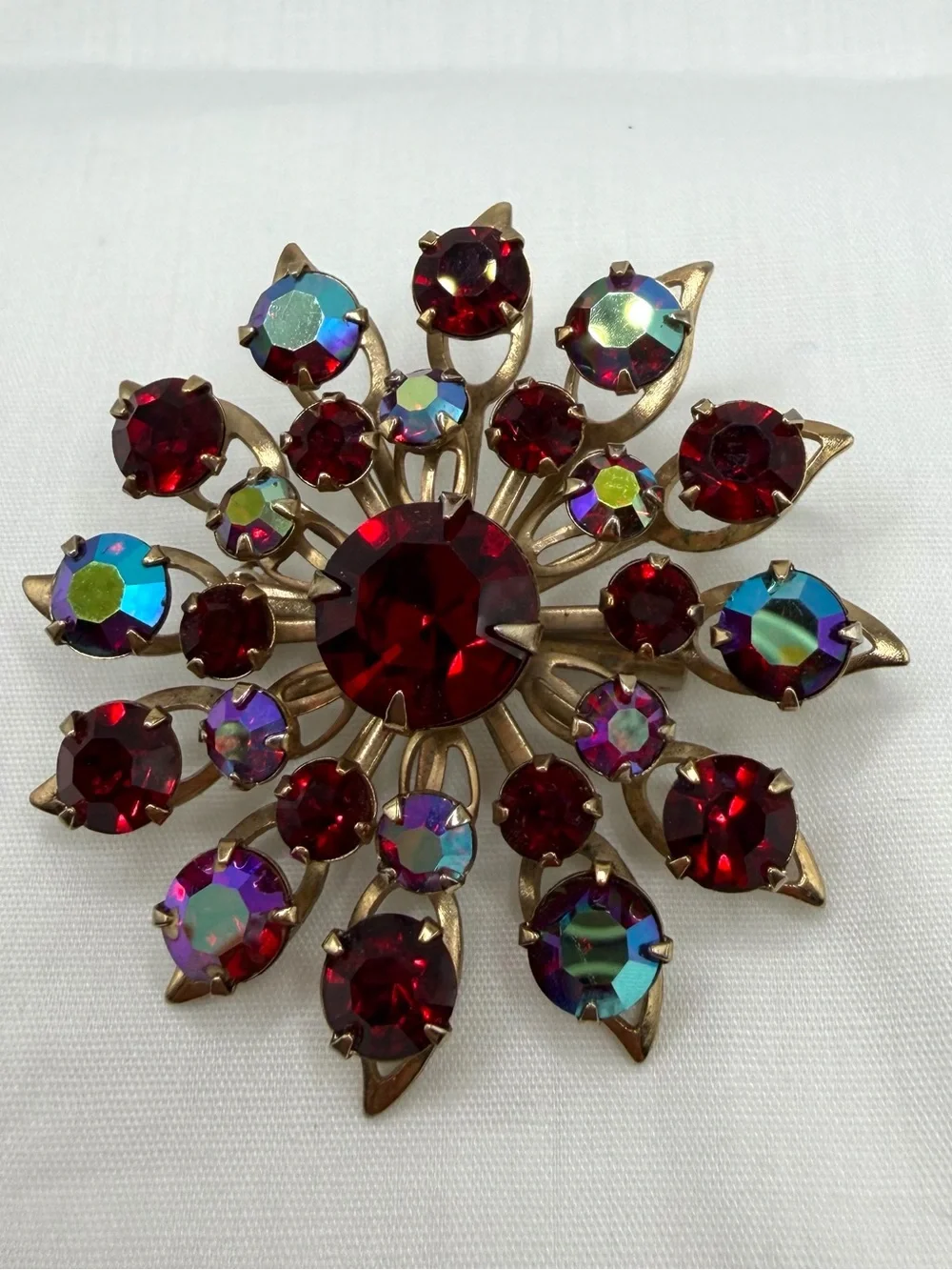Vintage Starburst Brooch Pin Goldtone Faceted Deep Red Iridescent Rhinestones